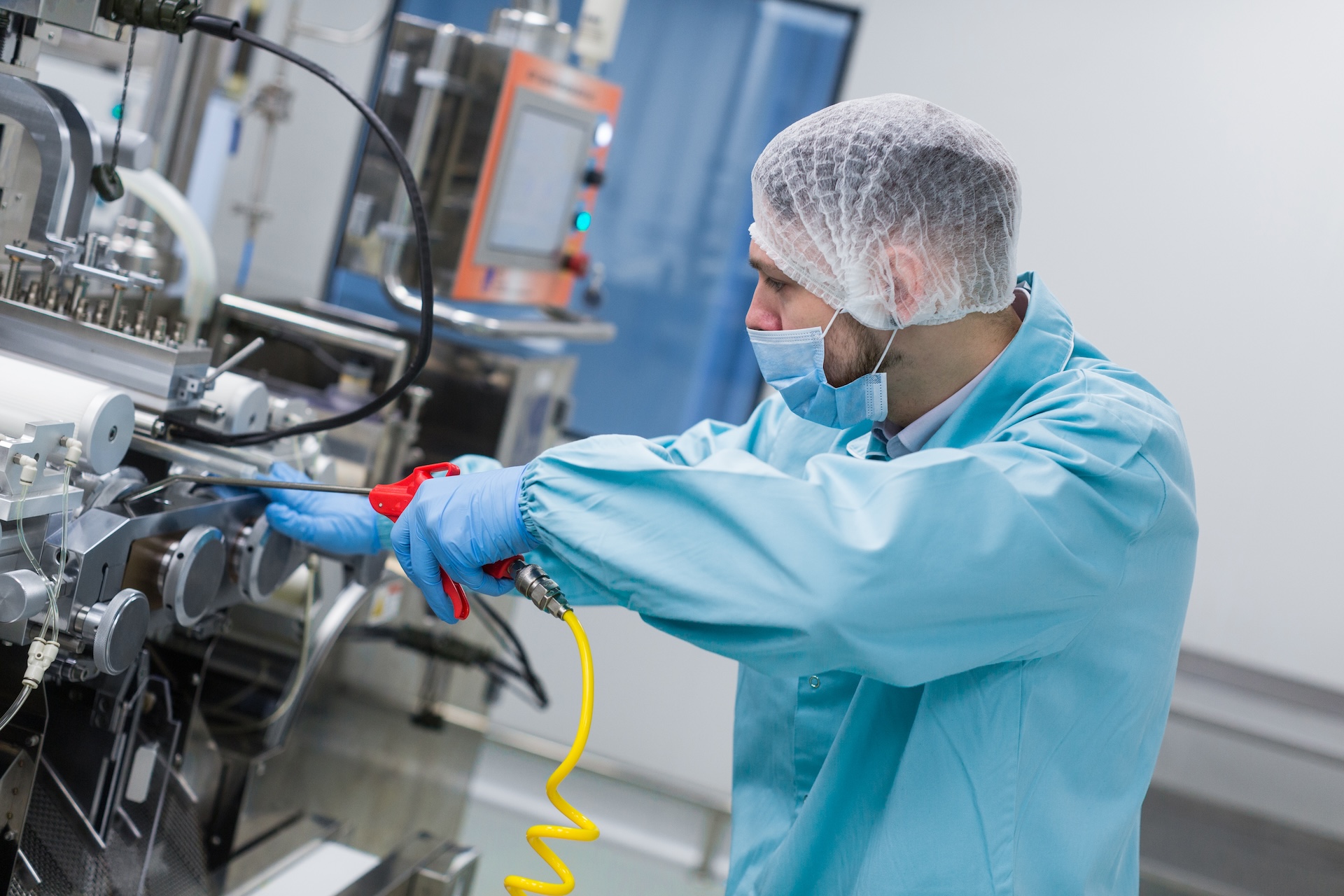 Healthcare professional working with medical equipment